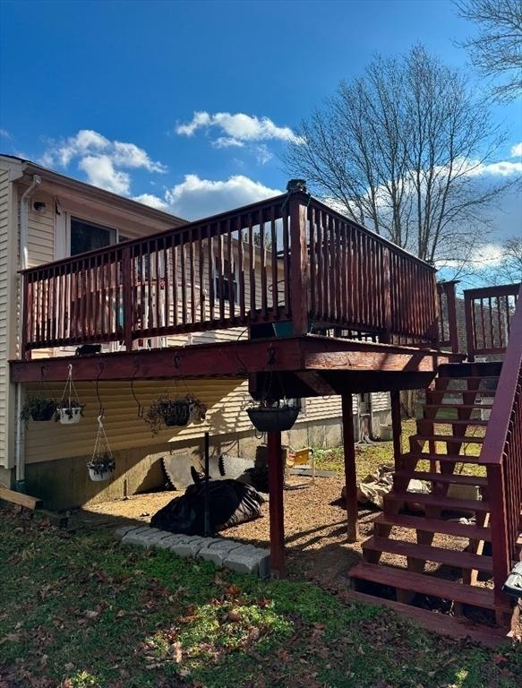 exterior space featuring a wooden deck