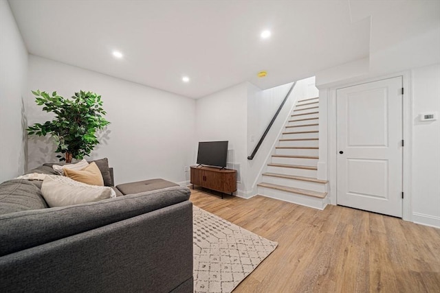 1135-1137 Hyde Park Ave Unit 1, Boston, MA 02136 - living room with light wood-type flooring, stairs, recessed lighting, and baseboards