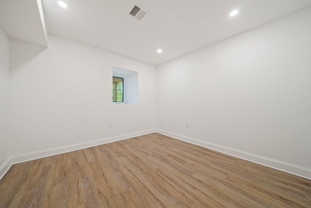 1135-1137 Hyde Park Ave Unit 1, Boston, MA 02136 - empty room featuring wood finished floors, recessed lighting, and baseboards