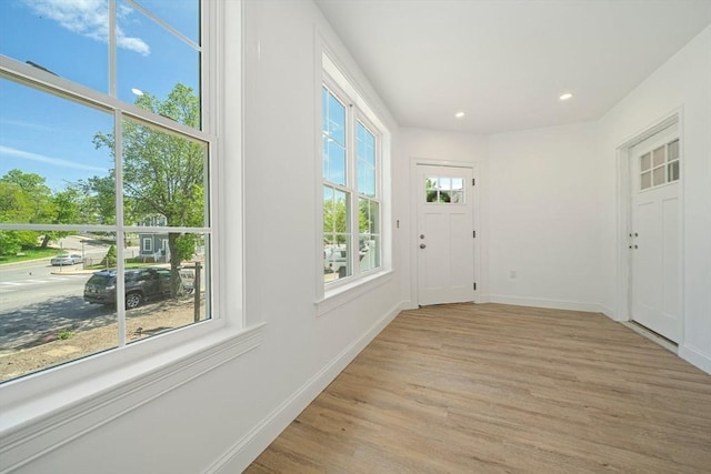 1135-1137 Hyde Park Ave Unit 1, Boston, MA 02136 - entrance foyer with light wood finished floors, baseboards, and recessed lighting