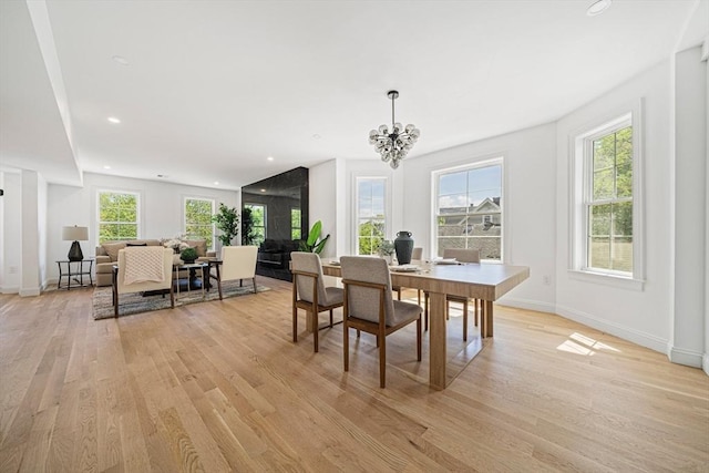 1135-1137 Hyde Park Ave Unit 1, Boston, MA 02136 - dining space with light wood-type flooring, a chandelier, baseboards, and recessed lighting