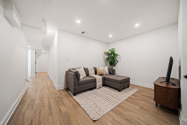 1135-1137 Hyde Park Ave Unit 1, Boston, MA 02136 - living area with wood finished floors, recessed lighting, and baseboards