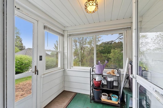 sunroom featuring tile patterned floors