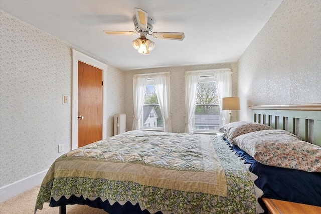 bedroom featuring wallpapered walls, carpet, ceiling fan, and baseboards