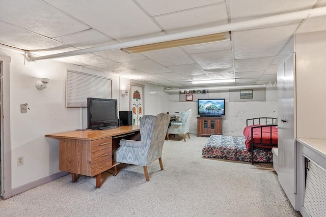 office area featuring carpet flooring and a drop ceiling