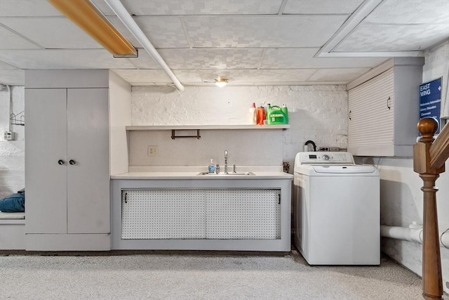 clothes washing area featuring washer / dryer