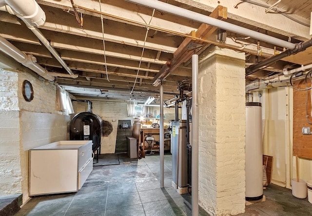 below grade area featuring water heater
