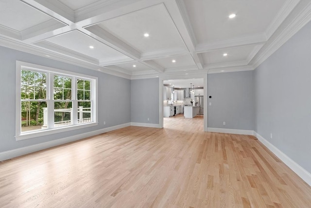 192 Tahattawan, Littleton, MA 01460 - unfurnished living room featuring coffered ceiling, light wood-type flooring, baseboards, beamed ceiling, and crown molding