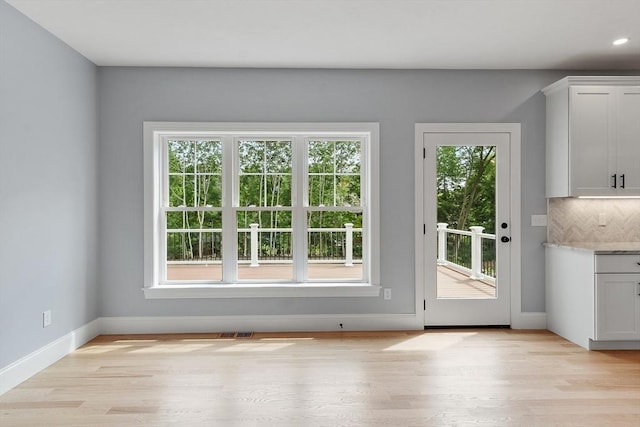 192 Tahattawan, Littleton, MA 01460 - entryway with baseboards, light wood finished floors, and recessed lighting