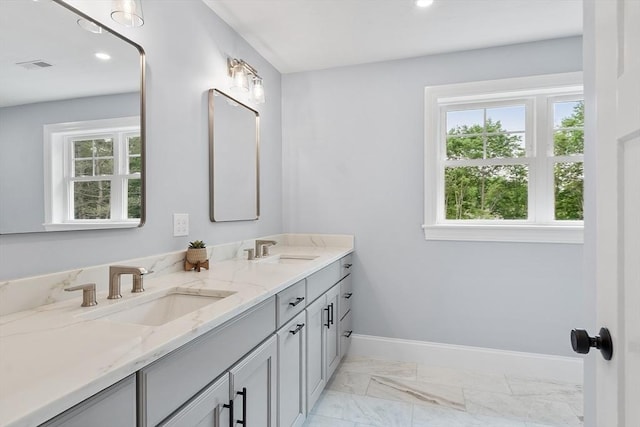 192 Tahattawan, Littleton, MA 01460 - full bath with double vanity, marble finish floors, baseboards, and recessed lighting