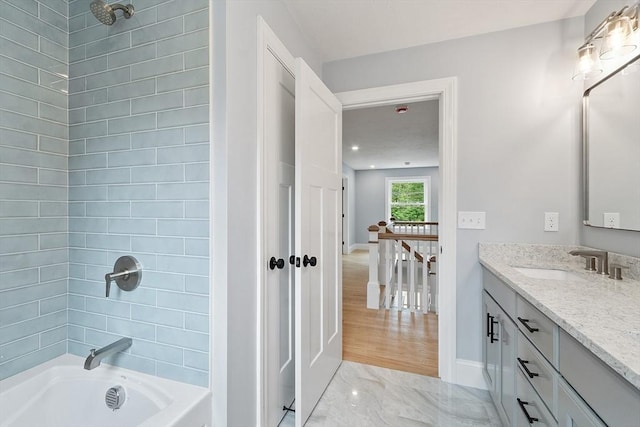 192 Tahattawan, Littleton, MA 01460 - full bath with vanity, tub / shower combination, and baseboards