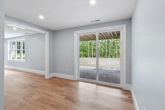 192 Tahattawan, Littleton, MA 01460 - empty room with baseboards, light wood-type flooring, and recessed lighting