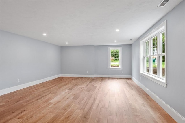 192 Tahattawan, Littleton, MA 01460 - unfurnished room with light wood finished floors, recessed lighting, and baseboards
