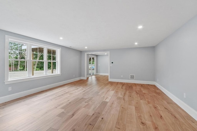 192 Tahattawan, Littleton, MA 01460 - unfurnished room with light wood-style floors, recessed lighting, and baseboards