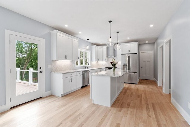 192 Tahattawan, Littleton, MA 01460 - kitchen with appliances with stainless steel finishes, a sink, tasteful backsplash, white cabinetry, and recessed lighting