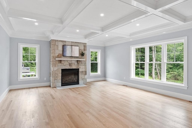 192 Tahattawan, Littleton, MA 01460 - unfurnished living room with baseboards, coffered ceiling, light wood-type flooring, plenty of natural light, and beamed ceiling