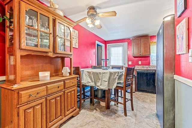 dining room featuring ceiling fan