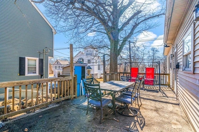 view of patio featuring outdoor dining area