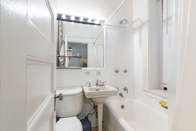 8 Garrison St Unit 110, Boston, MA 02116 - full bathroom with shower / bath combo, tile walls, and decorative backsplash