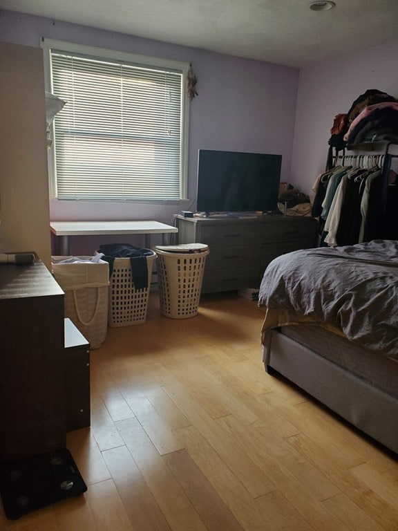 bedroom featuring light wood-style flooring