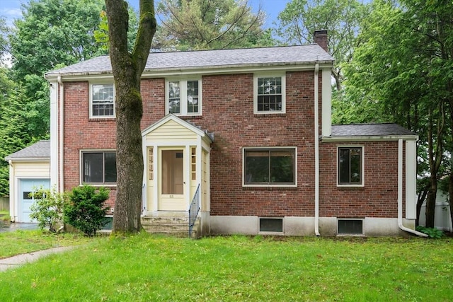 65 Kirkstall Rd, Newton, MA 02460 - colonial house featuring a chimney, a front yard, brick siding, a garage, and entry steps