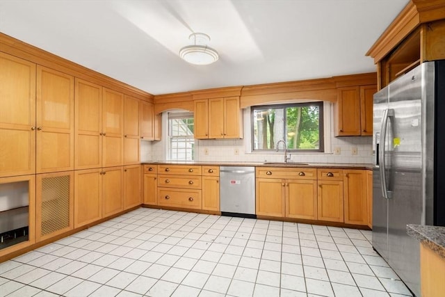 65 Kirkstall Rd, Newton, MA 02460 - kitchen featuring stainless steel appliances, backsplash, plenty of natural light, and light tile patterned floors