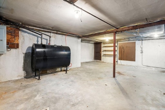 65 Kirkstall Rd, Newton, MA 02460 - unfinished below grade area featuring oil tank and electric panel