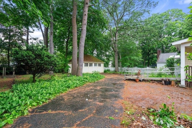 65 Kirkstall Rd, Newton, MA 02460 - view of yard featuring an outbuilding