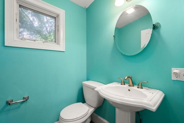65 Kirkstall Rd, Newton, MA 02460 - bathroom featuring toilet and baseboards