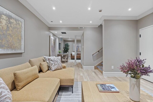 17 Alveston St Unit A, Boston, MA 02130 - living room featuring crown molding, baseboards, stairs, recessed lighting, and light wood-style floors