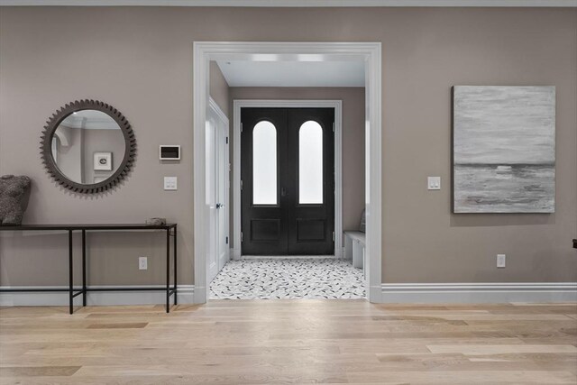 17 Alveston St Unit A, Boston, MA 02130 - foyer with wood finished floors, baseboards, and french doors