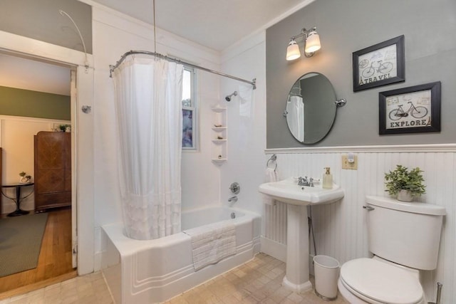 44 Fairview St, Fitchburg, MA 01420 - bathroom with shower / bath combo, toilet, wainscoting, and a sink