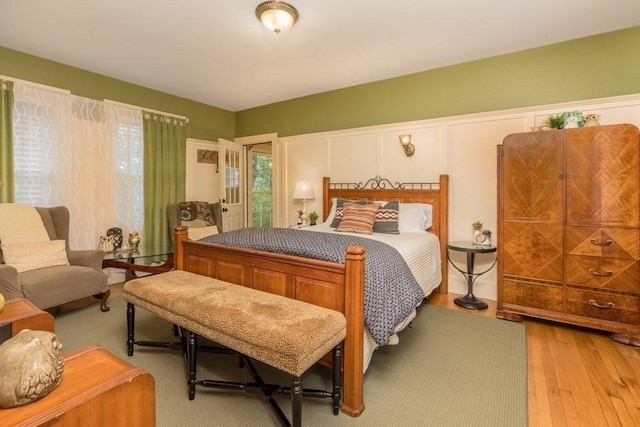 44 Fairview St, Fitchburg, MA 01420 - bedroom featuring light wood-style floors and a decorative wall