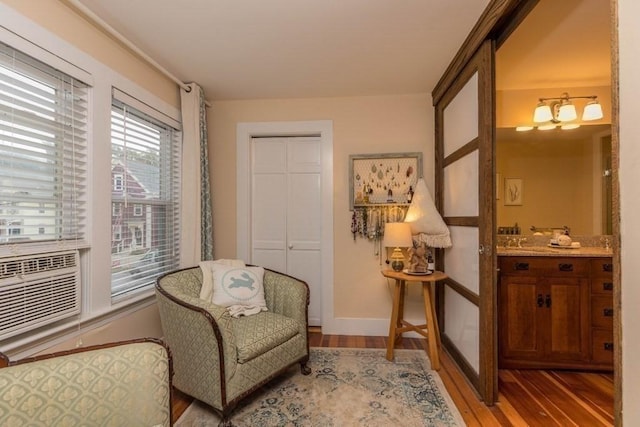 44 Fairview St, Fitchburg, MA 01420 - living area with baseboards and light wood-style floors