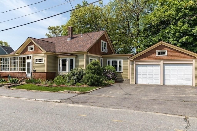 44 Fairview St, Fitchburg, MA 01420 - view of front of property with roof with shingles and a chimney