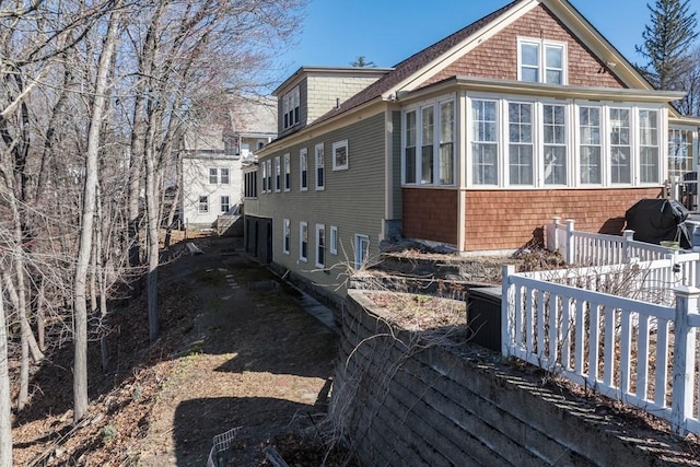 44 Fairview St, Fitchburg, MA 01420 - view of home's exterior featuring a sunroom