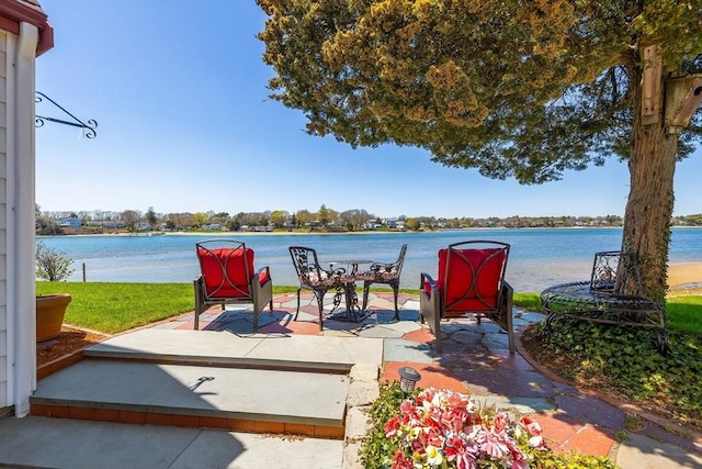 view of patio / terrace featuring a water view