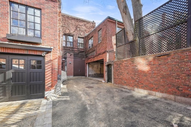 view of property exterior featuring brick siding