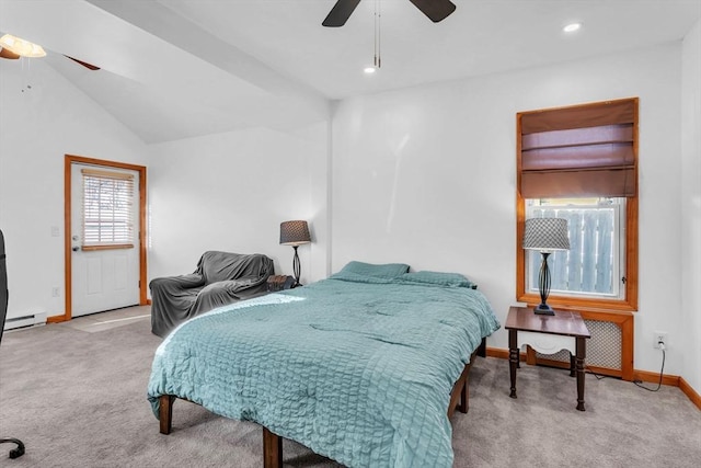 bedroom featuring light carpet, vaulted ceiling, and ceiling fan