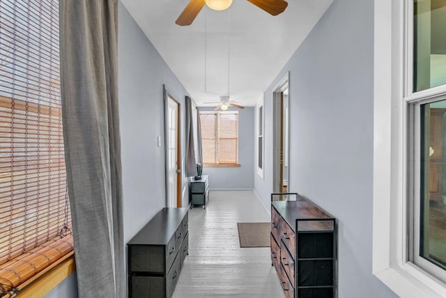 corridor featuring light hardwood / wood-style flooring