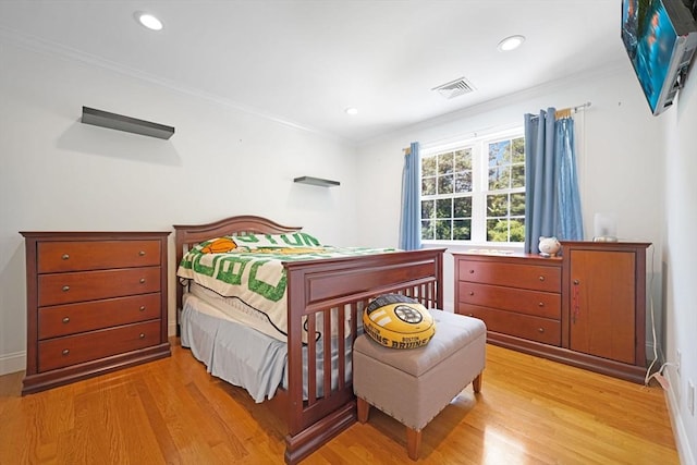 489 Main St, Acushnet, MA 02743 - bedroom with light wood-type flooring, crown molding, and recessed lighting