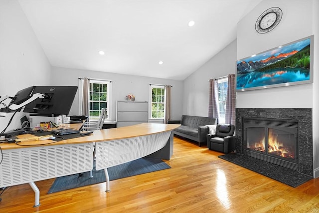 489 Main St, Acushnet, MA 02743 - office area featuring vaulted ceiling, wood finished floors, a glass covered fireplace, and recessed lighting