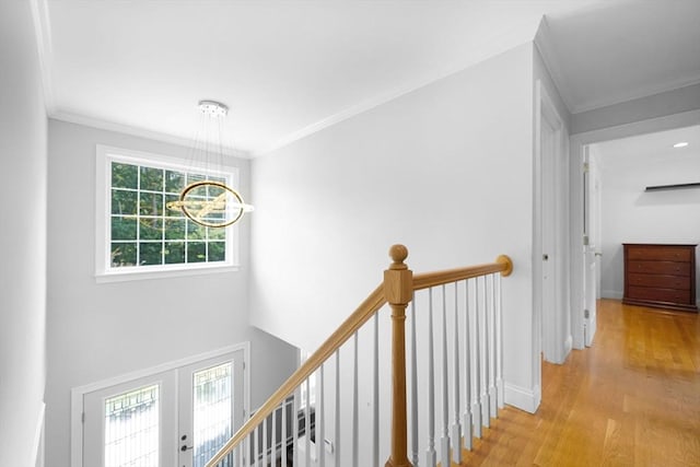 489 Main St, Acushnet, MA 02743 - hall with an upstairs landing, wood finished floors, a chandelier, and ornamental molding