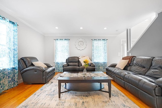 489 Main St, Acushnet, MA 02743 - living area with light wood finished floors, crown molding, recessed lighting, and stairway