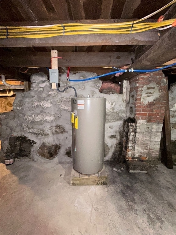 utility room featuring gas water heater