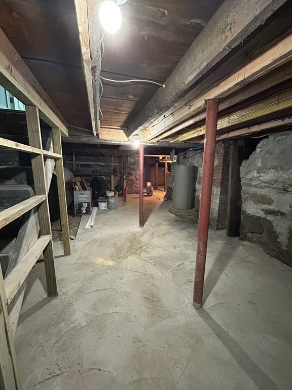 basement featuring gas water heater