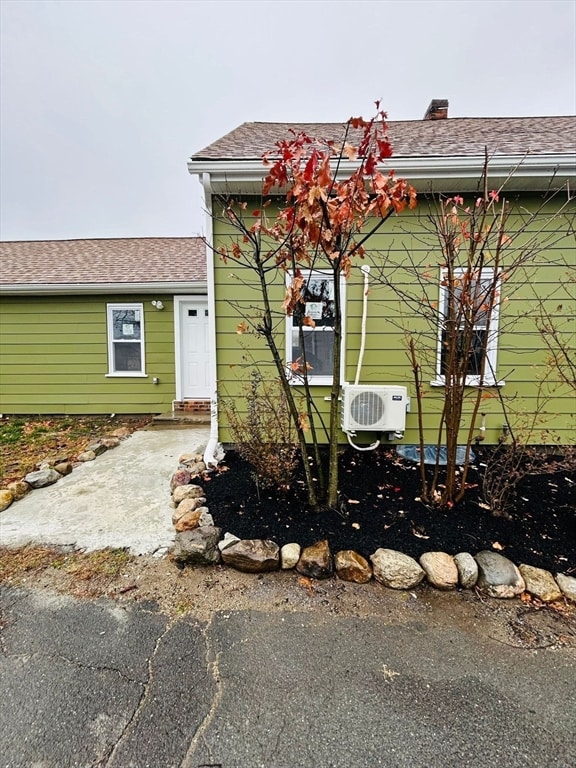 exterior space with ac unit