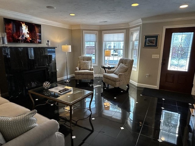 living room with ornamental molding, tile patterned flooring, and a textured ceiling