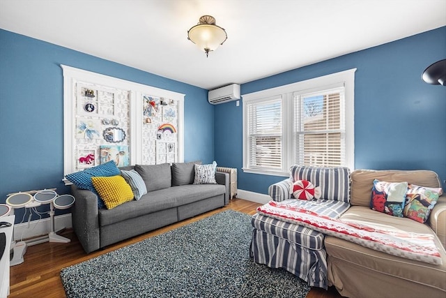 living area with radiator heating unit, a wall mounted air conditioner, baseboards, and wood finished floors