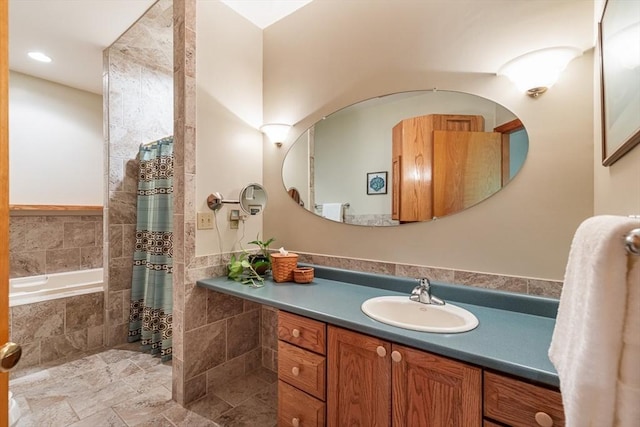 213 N Worcester St, Norton, MA 02766 - bathroom with vanity, a relaxing tiled tub, a shower with shower curtain, and recessed lighting